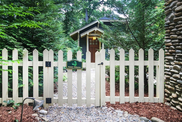 Welcome to Hattie's Hideaway!!
Gravel path leading from gravel driveway.