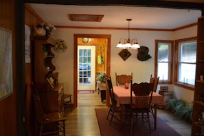 Dining Room has leaf table that expands to sit 6. 