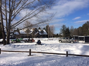 SLED AND TRAILER PARKING ACROSS THE STREET