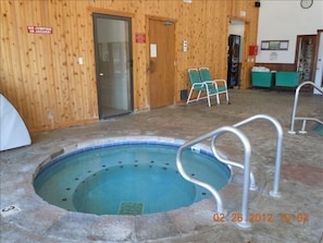 Jacuzzi in pool area.