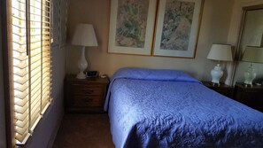 Another view of queen bedroom.