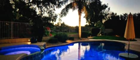 Pool with Open Space Behind Home
