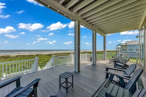 The Family deck from the living room is spacious with plenty of seating