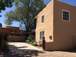 Entrance from Ledoux with parking in front of driveway