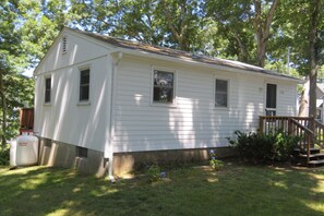 Cozy cottage on large shaded, lot, off street parking.