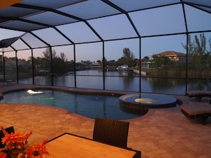 View of pool overlooking Bella Vista canal as sun sets.