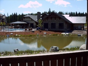 View from Patio of the Trout Pond, Clubhouse, and Pool
