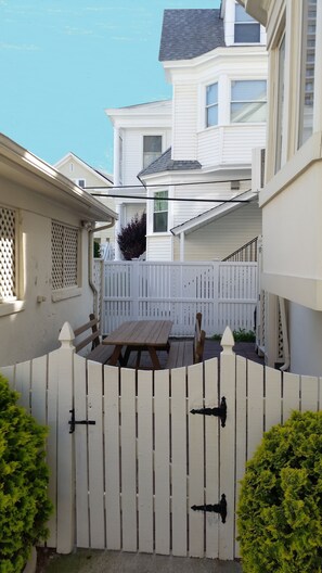 Fenced in yard, large picnic table, propane grill, shower. So much to enjoy