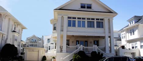 4-car driveway! Large fenced yard, lots of outdoor seating! Outside shower.