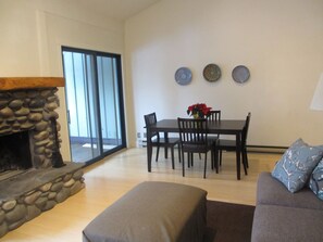 Living room toward the dining table (I have new chairs) and the porch.