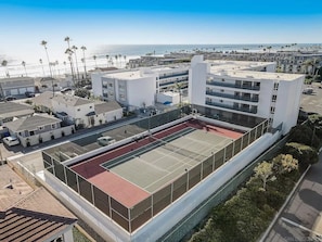 Get your tennis rackets or pickleball rackets and play on this private court!