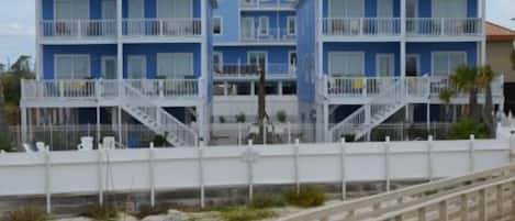 LOOKING AT BUILDINGS FROM BEACH WALK