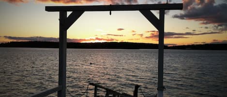 Calm evening sky. Dock  Pier, ramp and floating dock