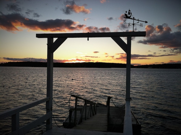 Calm evening sky. Dock Pier, ramp and floating dock
