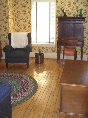 1930's living room with plantation desk and 3 piece parlor suite