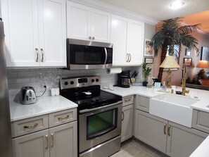 Beautiful New quartz countertops, cabinets, farm sink, Shiplap..
