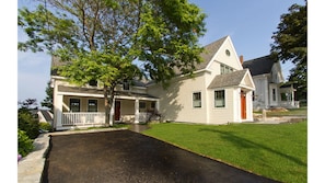 Entrance to home is via covered porch. Parking for 2 cars.