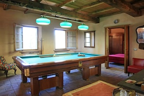 We've saved a Marani 1950's pool table for our Guests, there is a fireplace too!