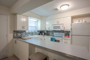 updated modern kitchen with all cooking utensils & appliances provided