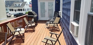 Large side deck has room for grilling and outdoor living.