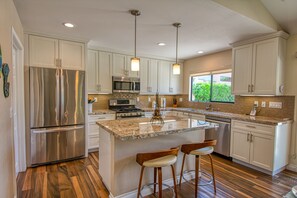 A modern, well appointed kitchen you'll love to cook in.