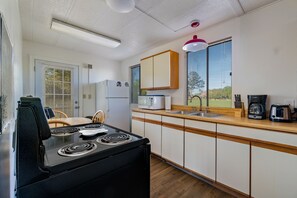 Kitchen area with eat in dining area. 
