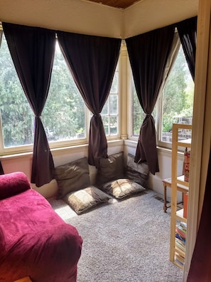 Reading nook attached to large bedroom