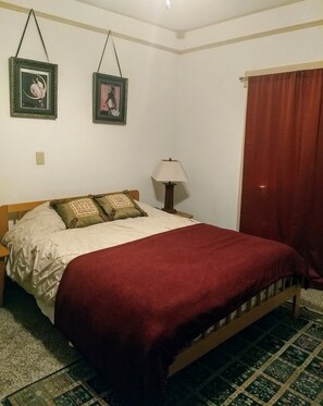 Large bedroom with queen size bed