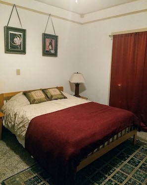 Large bedroom with queen size bed