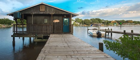 River house that sits in the river, private dock and walkway