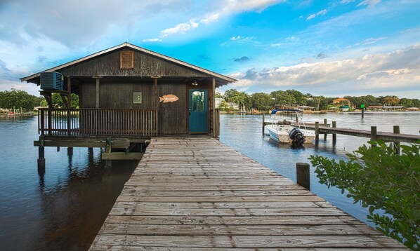 River house that sits in the river, private dock and walkway