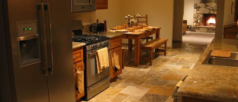 Kitchen to Dining Room through to fireplace in Living Room... 