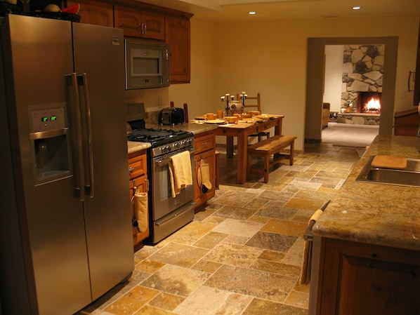 Kitchen to Dining Room through to fireplace in Living Room... 