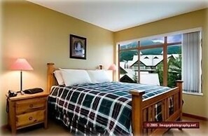Main Bedroom - wake up to a view of Whistler mountain. LCD TV / DVD in bedroom