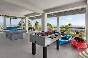 Play pool and foosball with cool breezes from the Atlantic Ocean