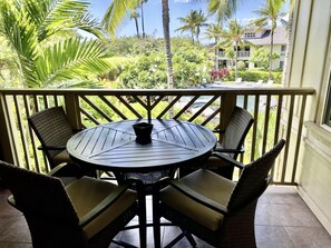 Lanai of condo looking out towards western pool of the complex