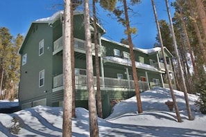 Large home with 4 front Deck Areas. Beautiful wooded lot and 4 car garage.