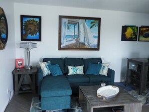 Enjoy the couch with it's chaise lounge and king size King  pull out bed. 