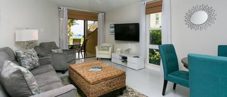 Beach view from patio.  Queen sofa bed in living room