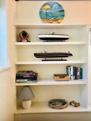 Built -in book shelves with nautical decor.