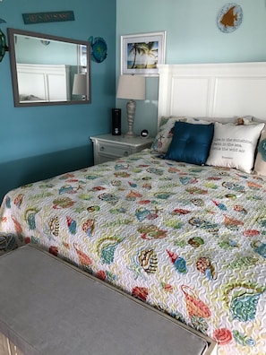 King Master Bedroom with balcony entrance and ocean front view