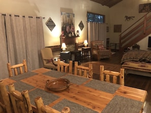 New in 2020: Cedar log table with 8 chairs.