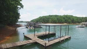 Single slip open dock. Quiet Cove. Swim Play Float. Boat & Jet Ski Rental nearby