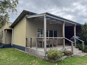 Deck area, front entrance on the left.