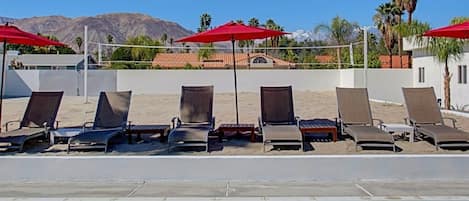 The beach and snow capped mountains together.  Half acre  with oversize pool.