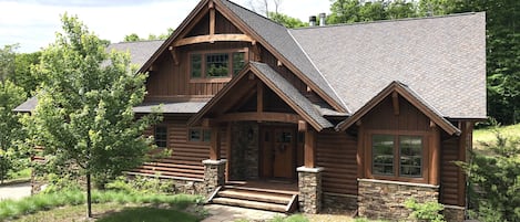 Front of lodge in the summer.