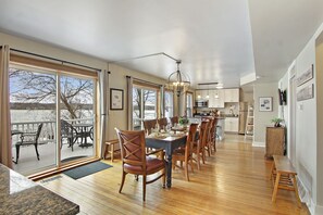 There’s a dining table for 10,  benches for extra seating, and counter stools. 