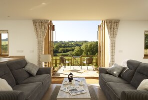 Lower ground floor: Sitting room with double doors leading out to the terrace