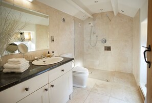 First floor: Limestone wet room with walk-in rain shower