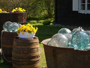 Design details are assembled from various local historical objects/tools